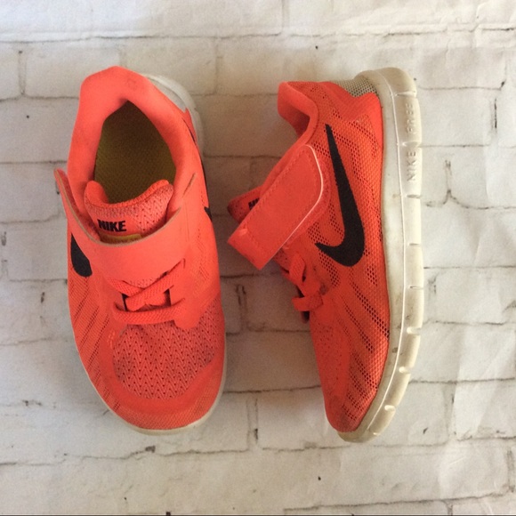 orange and black shoes nike